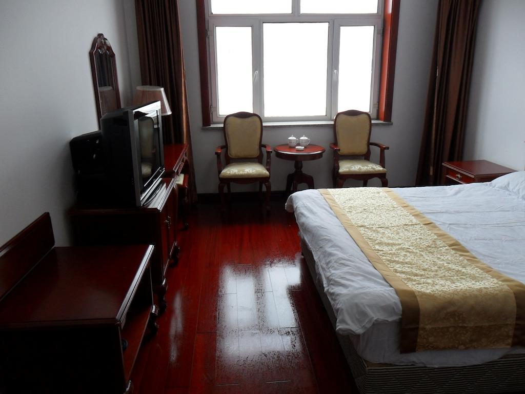 Yabuli The Olympic Club Hotel Harbin Quarto foto